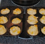 garlic cheddar biscuits in Lodge cast iron straight muffin pans