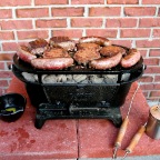 the record: 2 steaks, 4 burgers, 5 brats--all at the same time 3